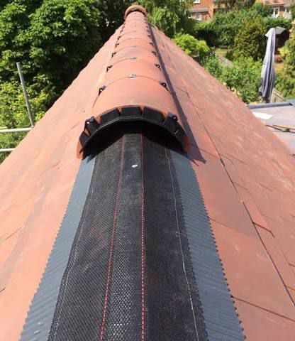 Dry ridge ventilation system installed on roof apex