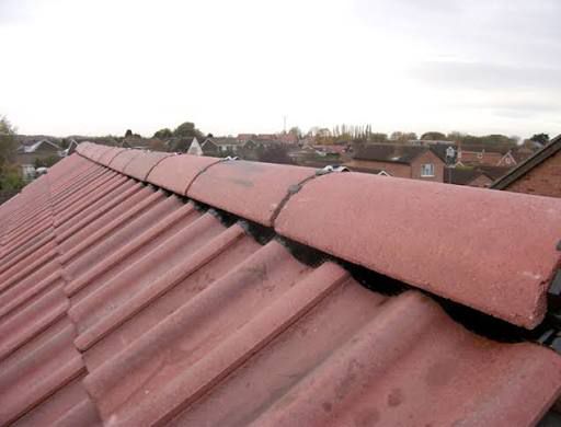Ridge capping on concrete tile roof in residential area