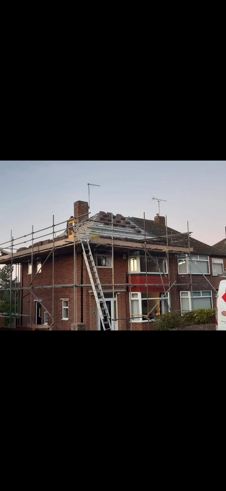 Terraced houses with slate and tile roofs in Ferryhill, County Durham
