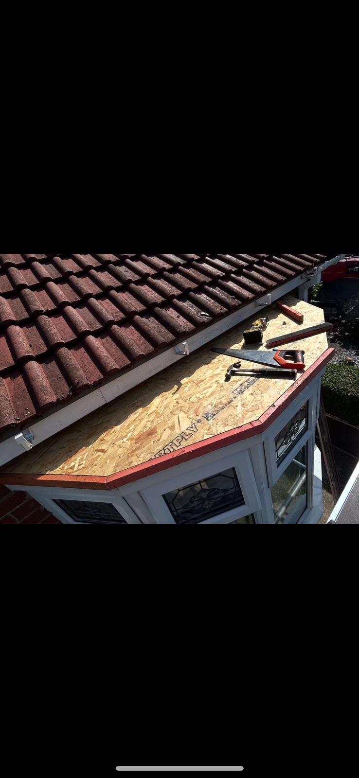 Vacuum-pole gutter cleaning on a residential property